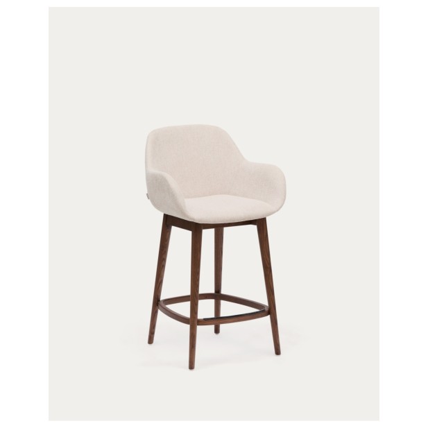 Taburete Konna beige y patas de madera maciza de fresno acabado oscuro 65 cm - Kave Home