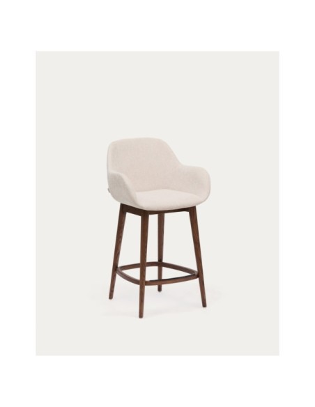 Taburete Konna beige y patas de madera maciza de fresno acabado oscuro 65 cm - Kave Home